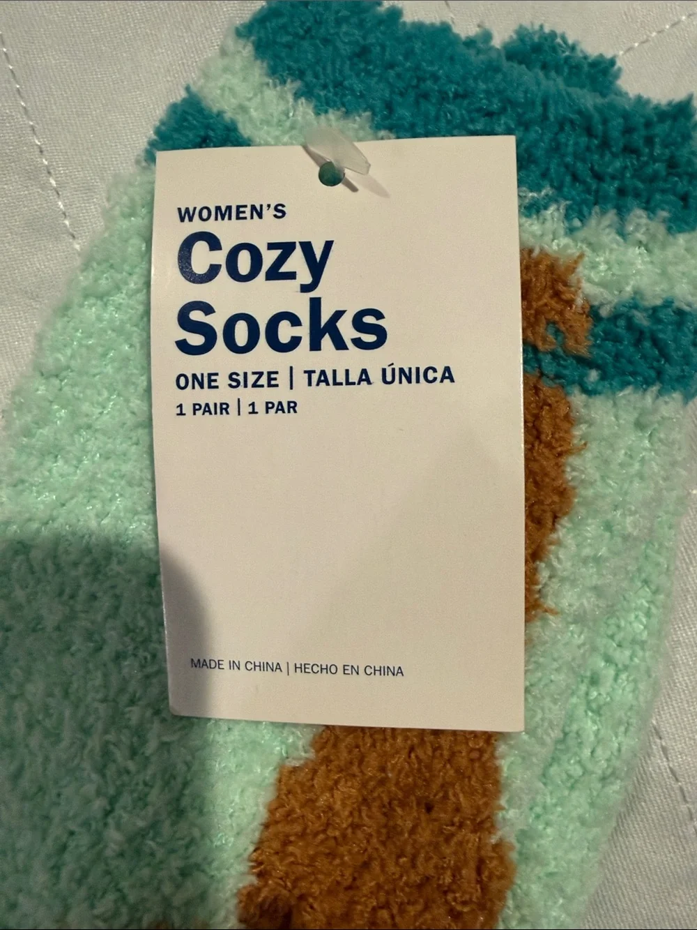 Sloth and Narwhal cozy socks